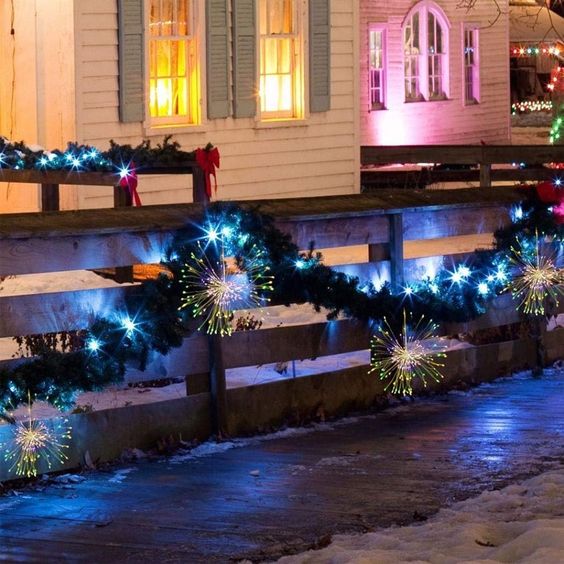 outdoor Christmas decor with fireworks lights