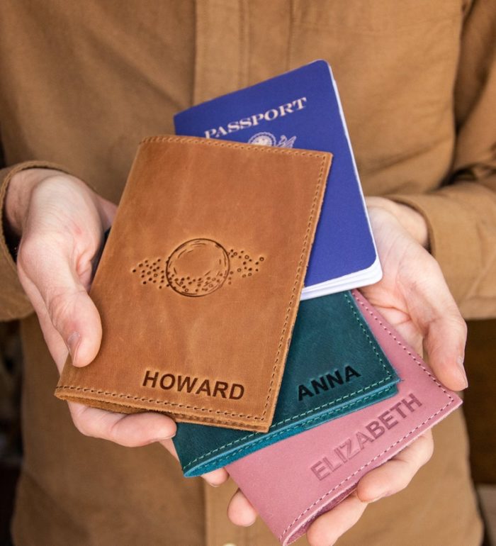 Passports as customized wedding gifts for couple. Image via Etsy.