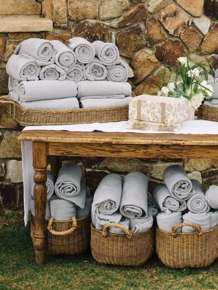 Give Blankets as personalized wedding gifts for guests. 