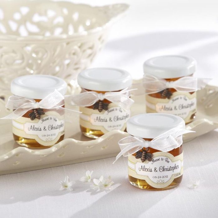 Give Honey Jars as personalized wedding favors for guests. 