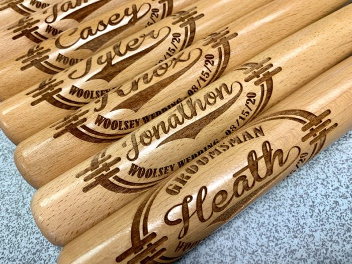 Give Customized Mini Baseball Bats as personalized groom gifts from bride. 
