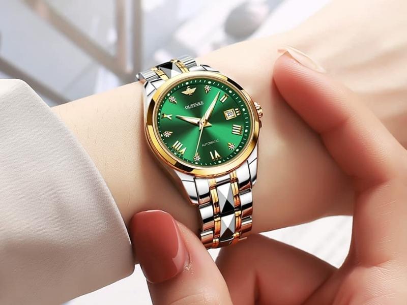 Gold Watch with Emerald Face for the 55th wedding anniversary gift tradition