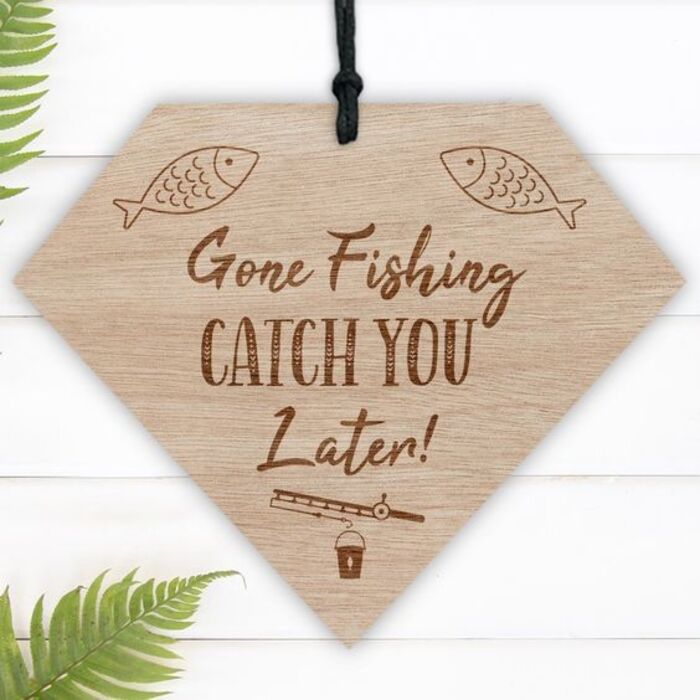 Gone fishing plaque: cool retirement gag gifts