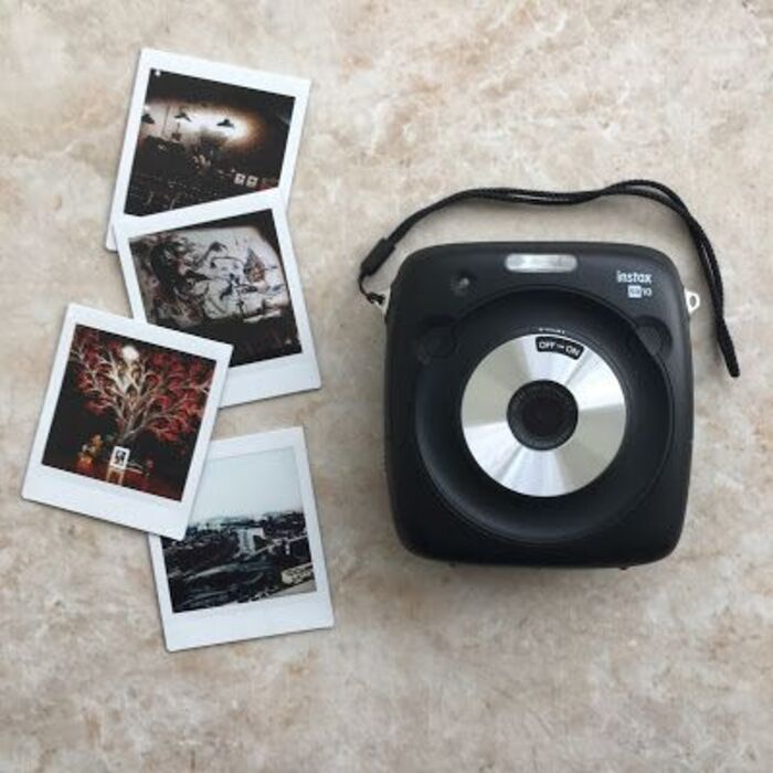 Polaroid Camera: Good Retirement Gifts For Coworker