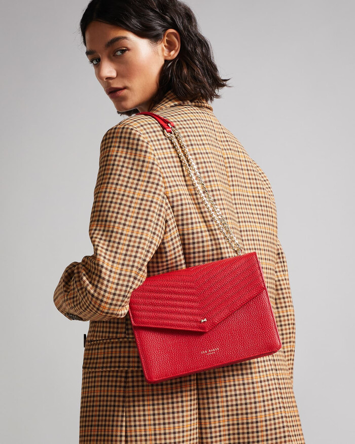 Red Crossbody - Christmas gifts for bestie Image via Google.