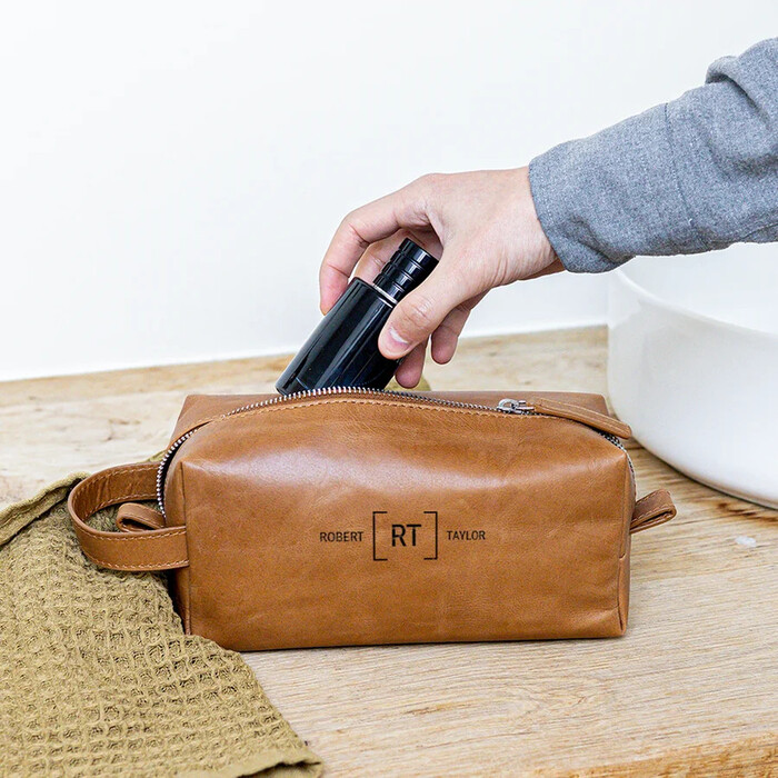 Personalized Leather Toiletry Bag - cheap Christmas gifts for boyfriend. Image via Google.