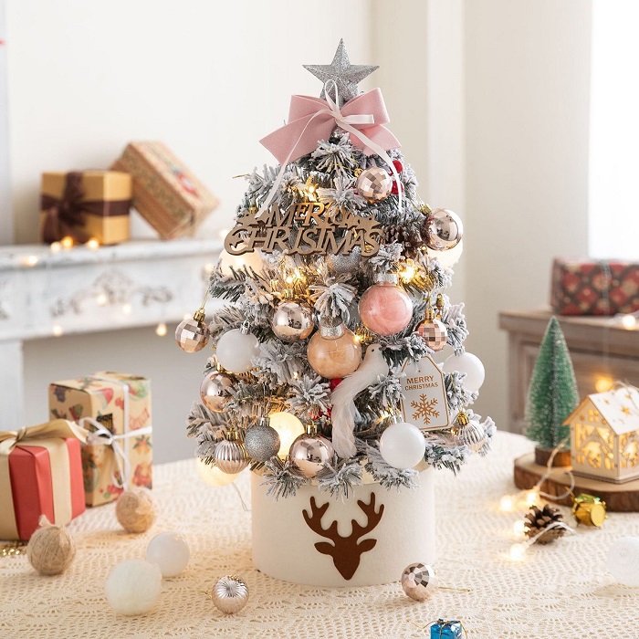 Baby Christmas trees for desk decorations. Image via Walmart.