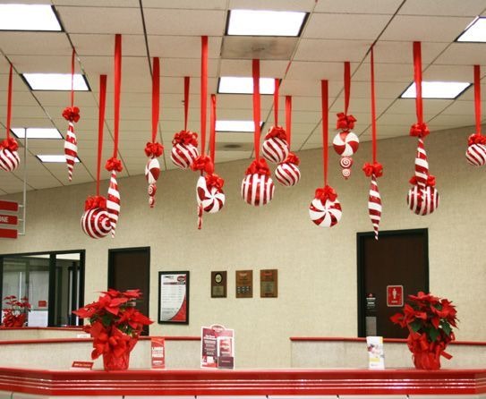 Hang candy canes from the office ceiling. Image via Pinterest.