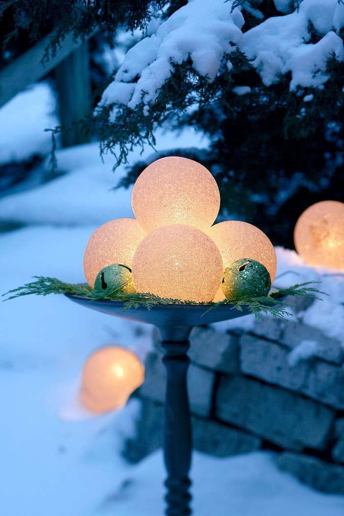 Christmas decorating ideas outside Glowing Frosted Globes
