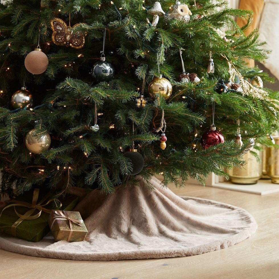 rustic Christmas decorations - Tree Skirt Elegance: A Grounding Presence