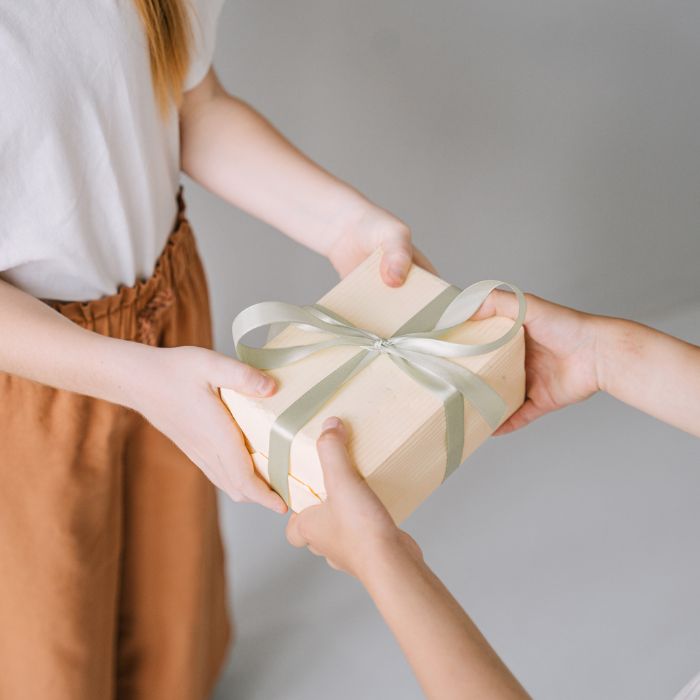 How to give someone a gift without being awkward